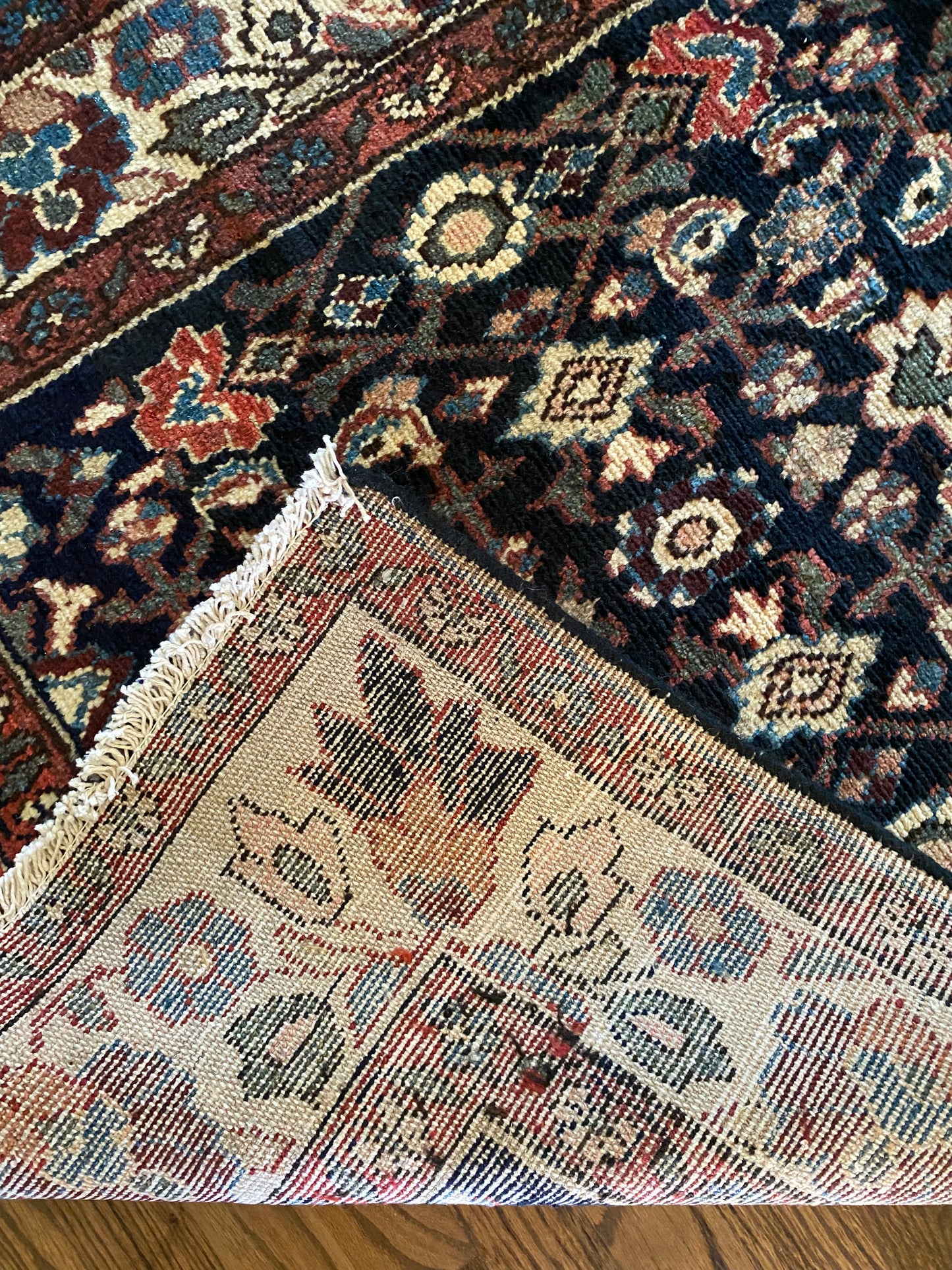 Antique Persian rug backing and pile detail Malayer