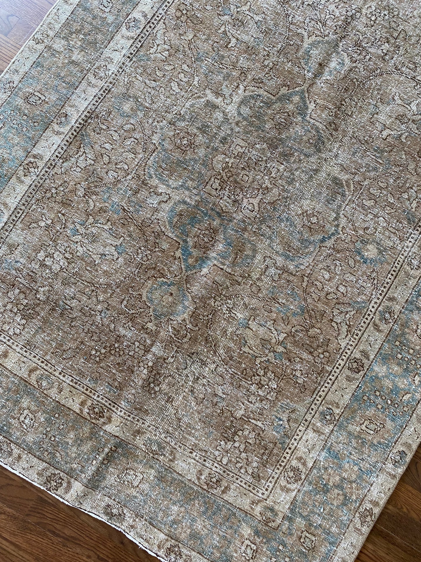 Tabriz rug border detail refined floral pattern