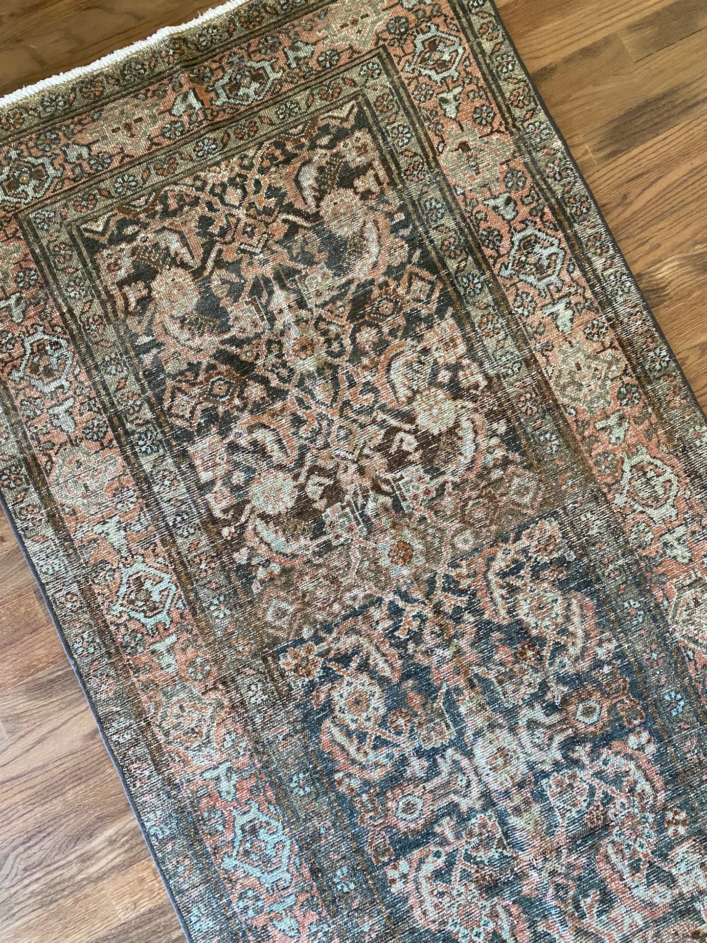 Vintage hallway runner wool rug layered neutral tones