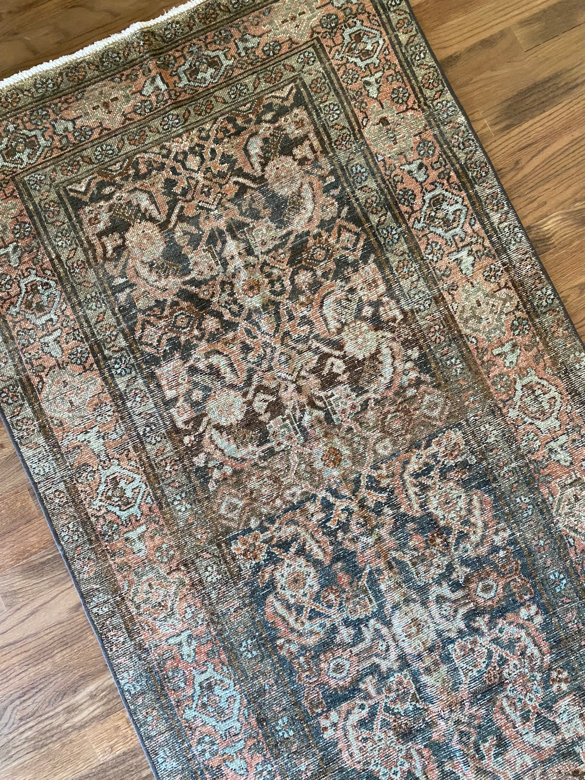 Vintage hallway runner wool rug layered neutral tones