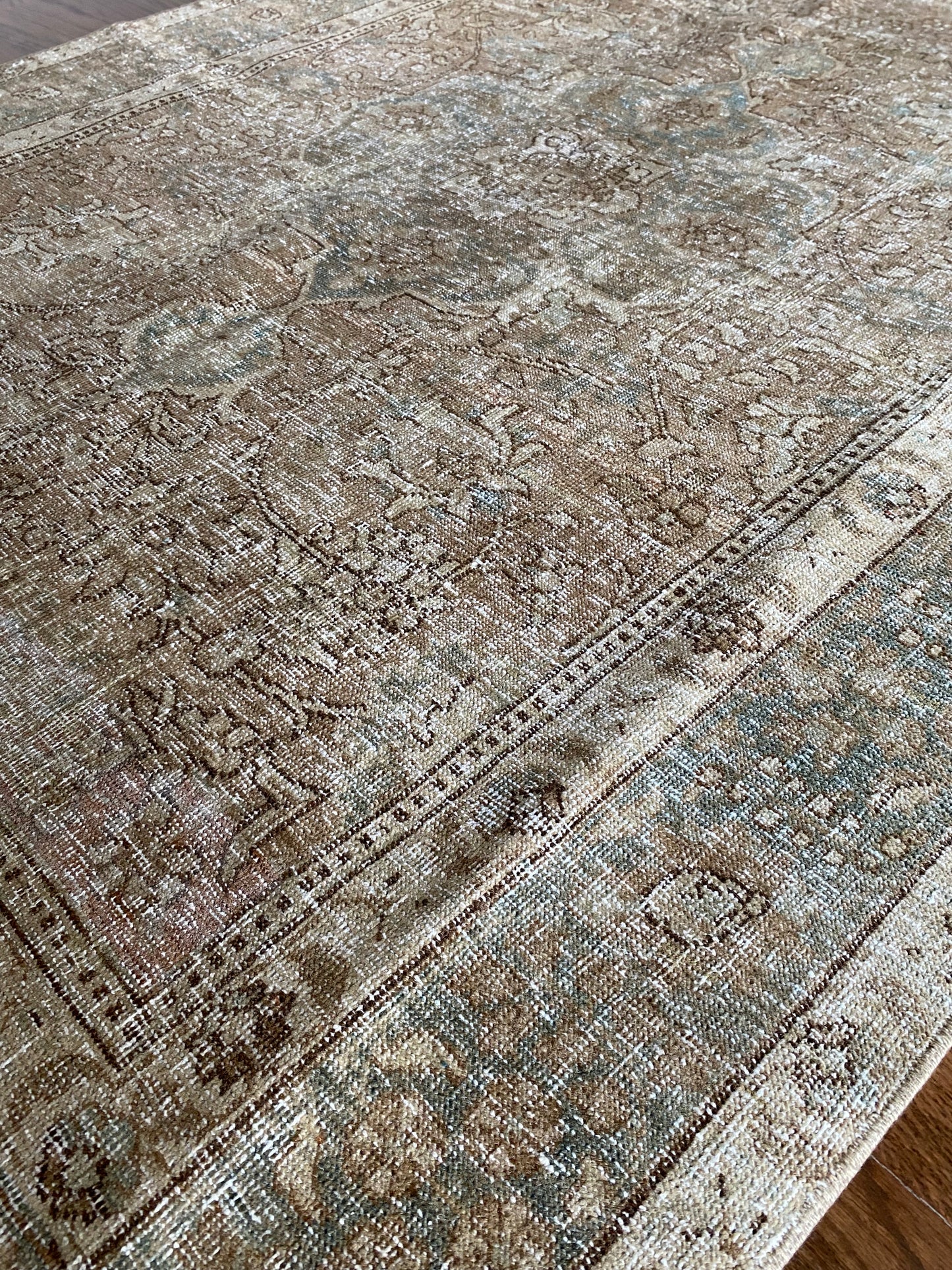 Neutral scatter rug soft tones bedroom or entry