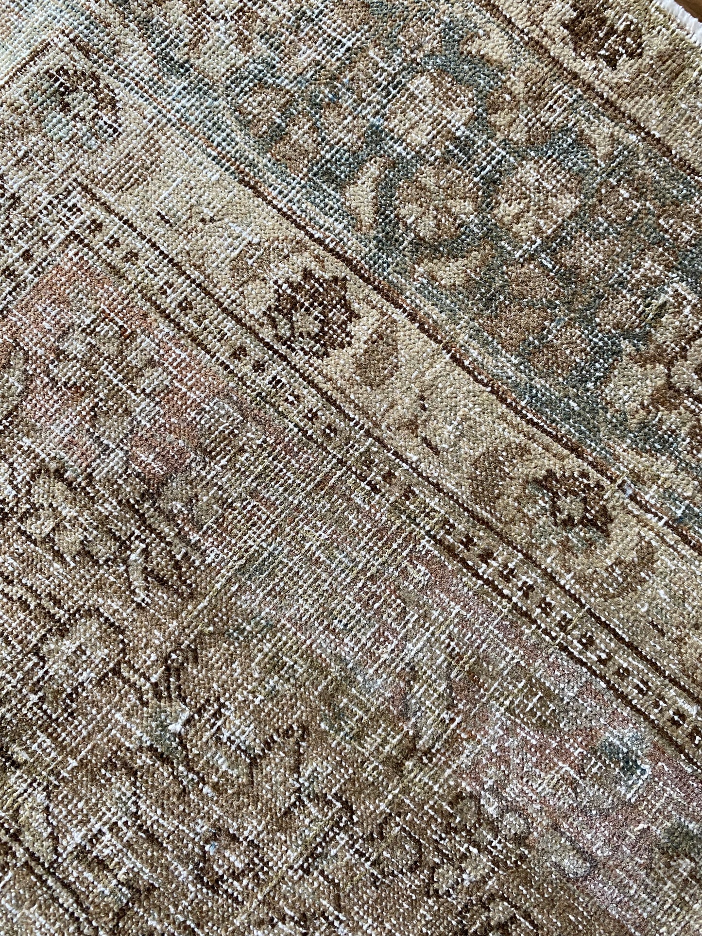 Vintage Persian rug 4x6 understated palette detail