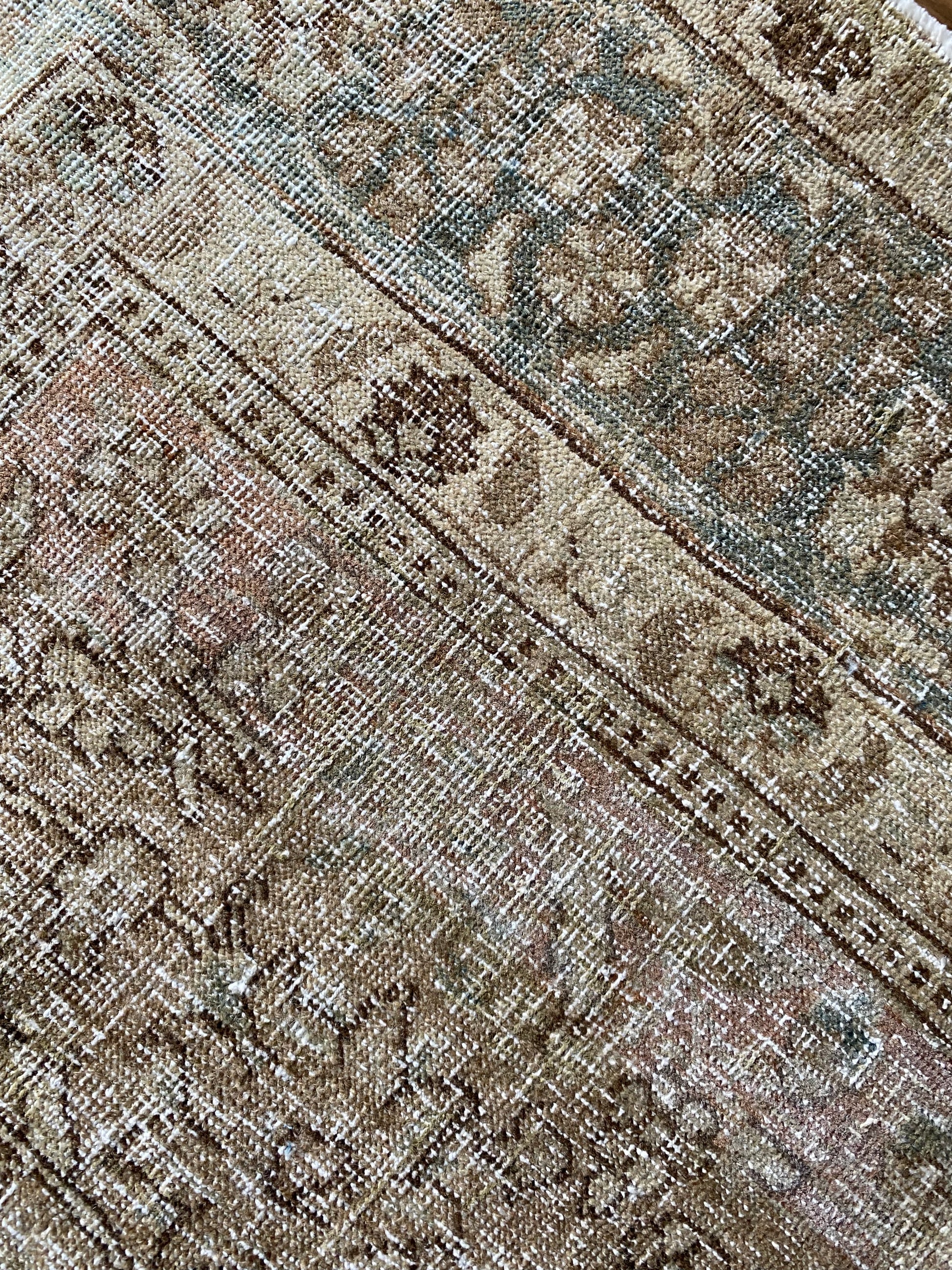 Vintage Persian rug 4x6 understated palette detail