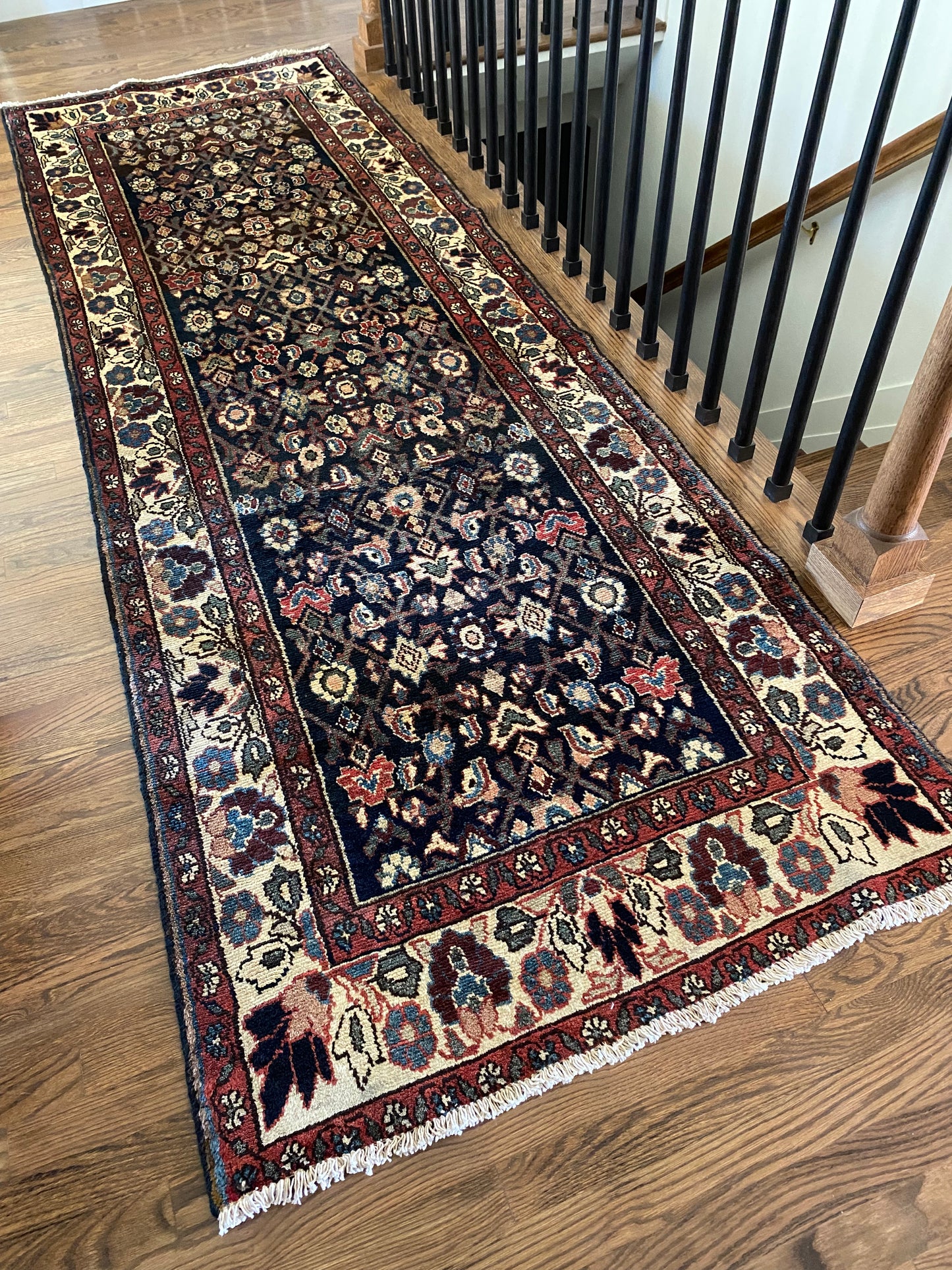 One of a kind Persian runner dark palette natural light