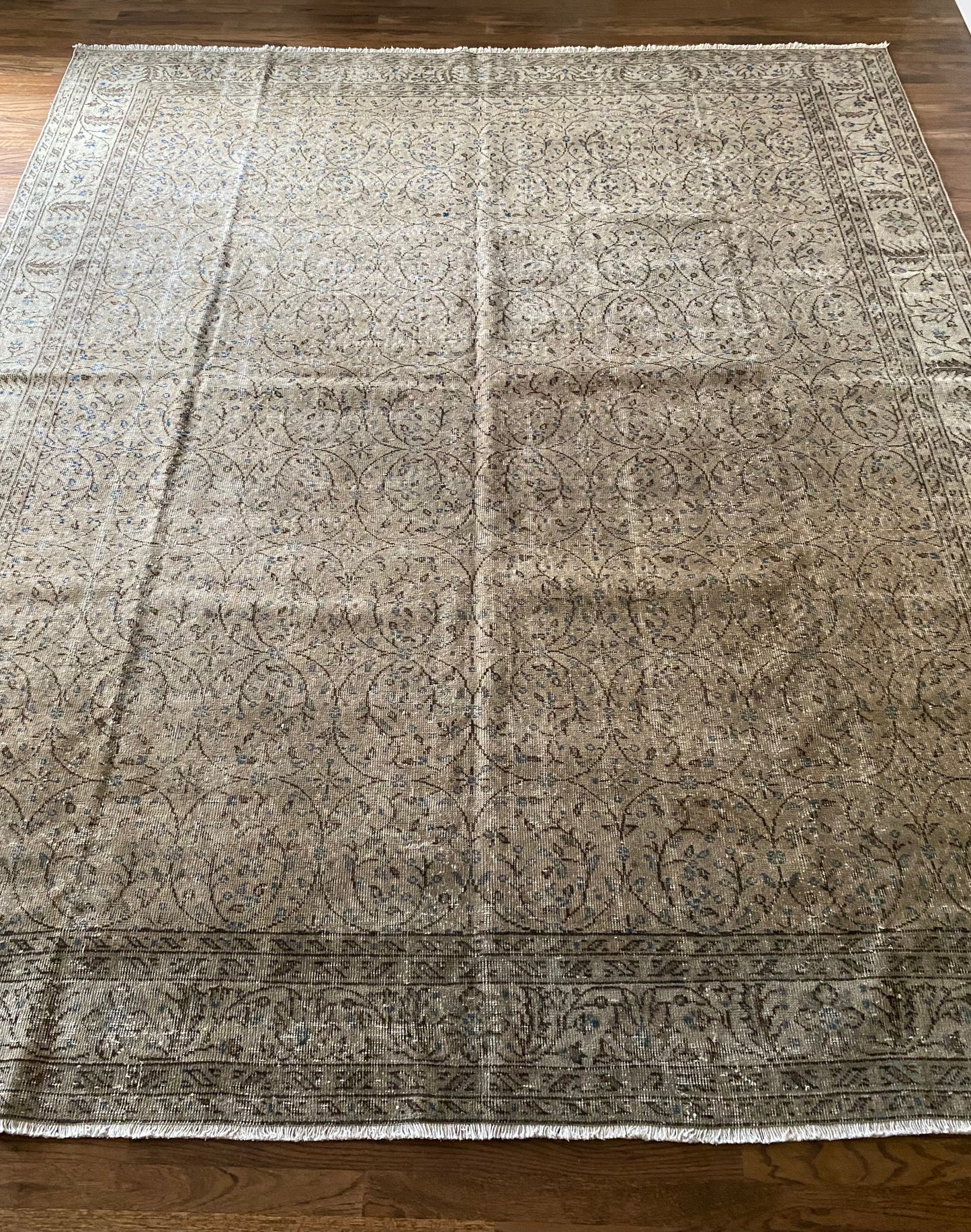 Neutral tan rug high traffic living room style