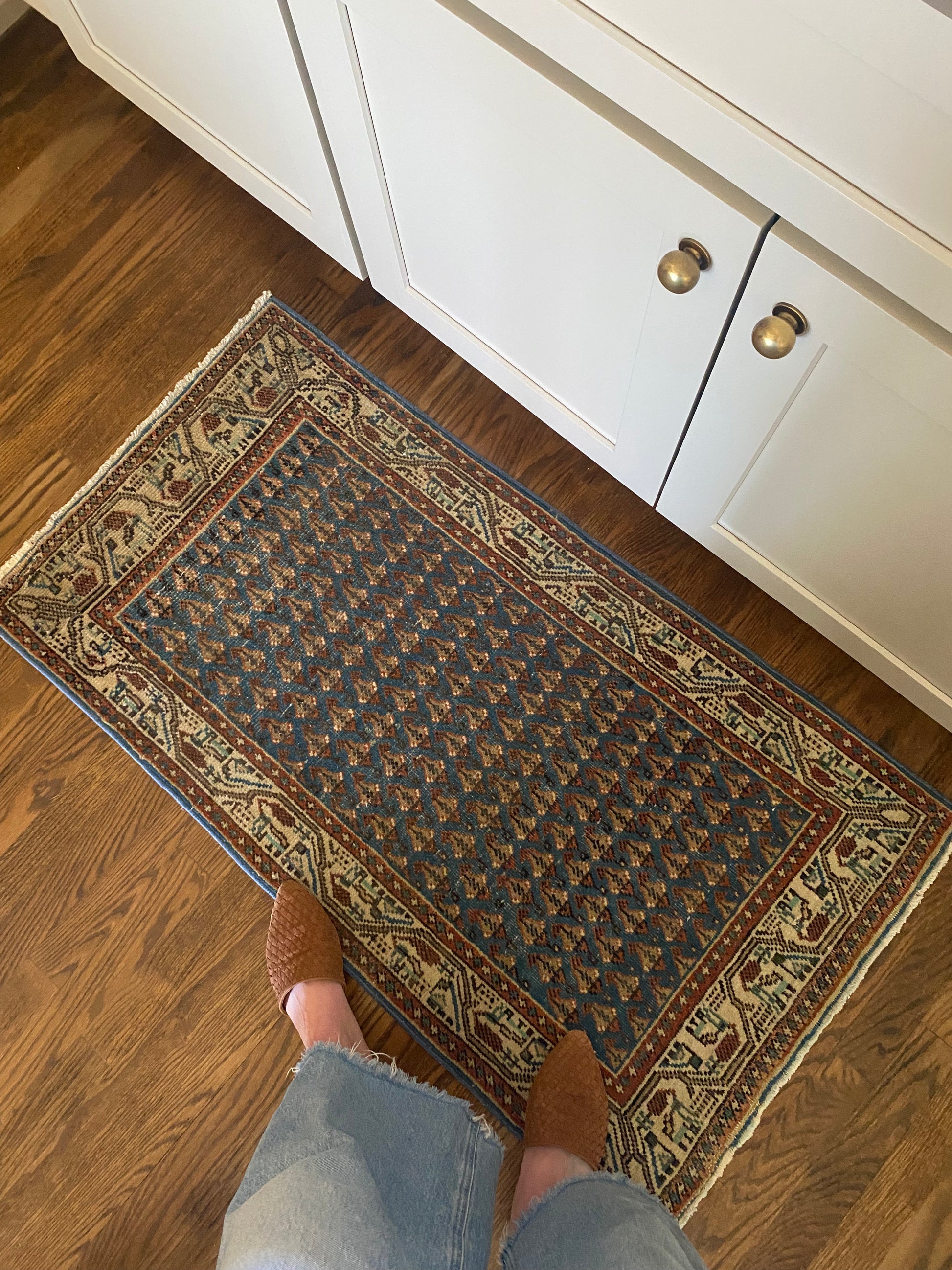 One of a kind Persian rug blue palette natural light